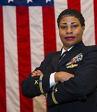 MILLINGTON, Tenn. (Nov. 3, 2017) Chief Warrant Officer (CWO) 5 Valencia Simmons-Fowler was promoted as the first African-American CWO 5 in the information warfare community on November 3rd. The CWO rank is a technical specialist who performs duties that directly related to their previous rating. They are accessed from the chief petty officer pay grades E-7 to E-9, and must have a minimum of 14 yeas of service. (U.S. Navy photo by Petty Officer 3rd Class Kyle Hafer/Released)
