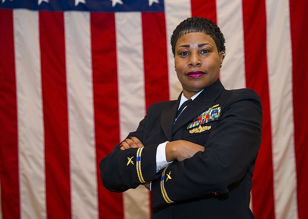MILLINGTON, Tenn. (Nov. 3, 2017) Chief Warrant Officer (CWO) 5 Valencia Simmons-Fowler was promoted as the first African-American CWO 5 in the information warfare community on November 3rd. The CWO rank is a technical specialist who performs duties that directly related to their previous rating. They are accessed from the chief petty officer pay grades E-7 to E-9, and must have a minimum of 14 yeas of service. (U.S. Navy photo by Petty Officer 3rd Class Kyle Hafer/Released)
