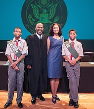 Judge Al Bennett with his wife and two sons/ credit: Grady Carter