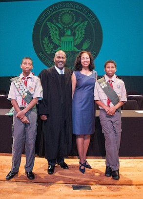 Judge Al Bennett with his wife and two sons/ credit: Grady Carter