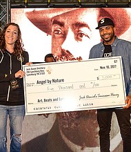 Jack Daniel’s Tennessee Honey presented a donation to DJ Mr. Rogers in support of Angel by Nature. The brand also encouraged event attendees to make additional donations onsite to help bring relief to Houston and surrounding areas that were impacted by Hurricane Harvey. Presented by Jack Daniel’s Tennessee Honey, Art, Beats and Lyrics showcases some of today’s best upcoming artists, along with seasoned veterans in art and music under one roof. For more information on the tour, visit www.JackHoneyABL.com. (Photo by Kat Goduco/AB+L)