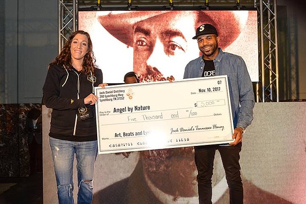 Jack Daniel’s Tennessee Honey presented a donation to DJ Mr. Rogers in support of Angel by Nature. The brand also encouraged event attendees to make additional donations onsite to help bring relief to Houston and surrounding areas that were impacted by Hurricane Harvey. Presented by Jack Daniel’s Tennessee Honey, Art, Beats and Lyrics showcases some of today’s best upcoming artists, along with seasoned veterans in art and music under one roof. For more information on the tour, visit www.JackHoneyABL.com. (Photo by Kat Goduco/AB+L)