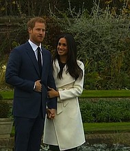 Prince Harry and Meghan Markle make their first appearance after announcing they are now engaged to be married in 2018./CNN