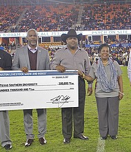 The Houston Livestock Show and Rodeo (HLSR) supports Texas Southern University with a $100,000 check for the Interdisciplinary Health Professions Simulation Center. Joel Cowley, HLSR president and chief executive officer, presented the check to TSU President Austin Lane, along with HLSR Vice President Terence Fontaine, HLSR Director and Houston City Councilmember Dwight Boykins, and Congresswoman Sheila Jackson Lee.