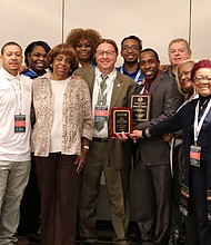 Thornton Township President Frank M. Zuccarelli poses with township elected officials and township staff at the November 2017 Township Officials of Illinois Award Ceremony. Thornton Township received Best Illinois Township Website Award, Best Illinois Social Media Award, and Mr. Zuccarelli received Friends of the Youth Award. President and Supervisor Frank M. Zuccarelli standing in the front, center holding one of the awards.
