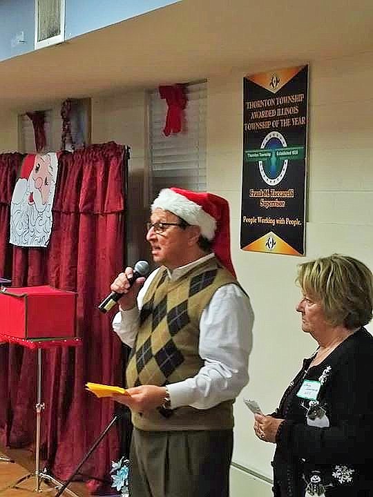 (Pictured left) Thornton Township President Frank M. Zuccarelli and (right) Spirit of Thornton Township Co-chair Shirley Bloodworth addressed the audience at the annual Spirit of Thornton Township. The Spirit of Thornton Township event is the beginning of the Christmas season celebration. 