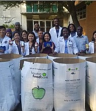  APhA-ASP students in front of their donations before being dropped off at the Houston Foodbank/ credit: Texas Southern University
