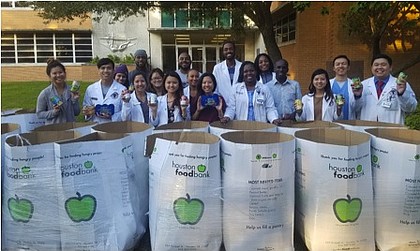  APhA-ASP students in front of their donations before being dropped off at the Houston Foodbank/ credit: Texas Southern University