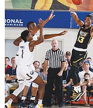 Virginia Commonwealth University guard Malik Crowfield hands off the ball during the Rams’ 83-69 victory on Nov. 21 over the University of California, Berkeley during the Maui Invitational.