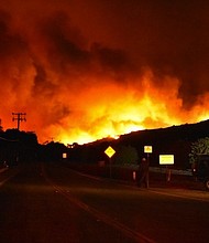 The Ventura Country Fire Department posted this image of the Thomas Fire pushing its way toward East Ventura late Monday night.
Source:	Ventura County Fire Department