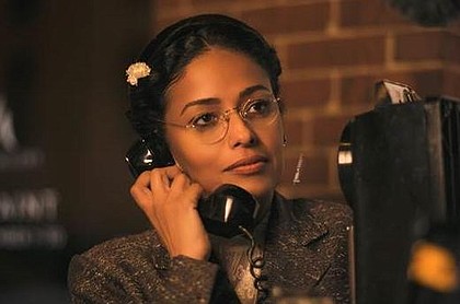 In a scene from TV One’s ‘Behind the Movement,’ Rosa (Golding) is finally allowed to make her one phone call to let her husband know she’s in jail (photo via TV One)