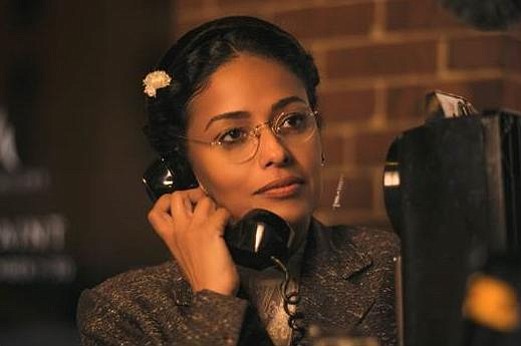 In a scene from TV One’s ‘Behind the Movement,’ Rosa (Golding) is finally allowed to make her one phone call to let her husband know she’s in jail (photo via TV One)