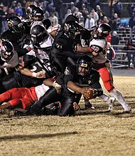 With 2:28 left on the clock, Highland Springs High School freshman Dre’Shawn Taylor stretches the ball across the goal line to give the Springers a 28-18 victory last Saturday over Nansemond River High School of Suffolk in the state 5A semifinals. The Springers will play Tuscarora High School of Leesburg on Saturday, Dec. 9, for the state title.