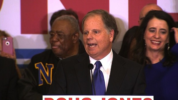 Doug Jones speaks at his election headquarters on December 12th, 2017. CNN projects that Alabama voters will elect Democrat Doug Jones to the US Senate, defeating Republican Roy Moore./pool