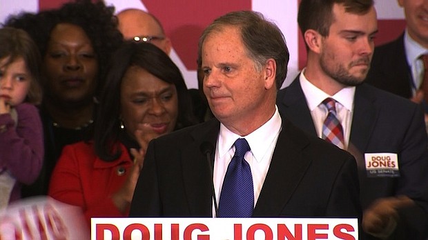 Doug Jones speaks at his election headquarters on December 12th, 2017. CNN projects that Alabama voters will elect Democrat Doug Jones to the US Senate, defeating Republican Roy Moore./pool