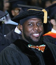 Charlottesville Vice Mayor Wes Bellamy receives his doctorate at Sunday’s ceremony, where VSU conferred degrees on 306 graduates.