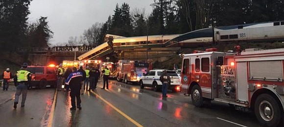 The way Charlie Heebner remembers it, being aboard the passenger train that hurtled off an overpass in Washington state Monday …