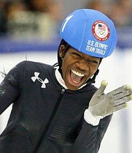 Maame Biney reacts after winning women’s 500-meter during the U.S. Olympic short track speedskating trials Dec. 16, 2017, in Kearns, Utah. (AP Photo/Rick Bowmer)