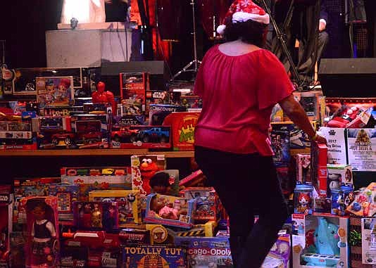The 100 Black Men of Chicago, Inc. (100BMC), recently hosted its 16th Annual Toy Drive & Holiday Party, at the Alhambra Palace Restaurant, to benefit women and children in homeless shelters, community outreach organizations and health centers. Photo Credit: Christopher Shuttlesworth