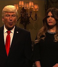 Alec Baldwin's President Trump stood alongside his wife, Cecily Strong's Melania Trump, as the two wished a Merry Christmas to all from the White House, with visits from Don Jr, Eric, Ivanka, and even Omarosa./NBC