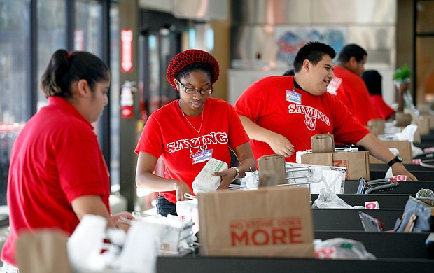 Employees at H-E-B on Montrose in Houston, TX
