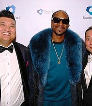 (L to R) SparkleCOIN Chief Financial Officer David Chen, Snoop Dogg, and SparkleCOIN founder and CEO Victor Wong. Photo Courtesy A. Turner Archives