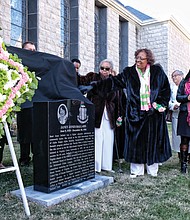 Members of Alpha Kappa Alpha Sorority unveil a marker last Saturday honoring the late Janet Jones Ballard, left, a Virginia Union University alumna and former administrator, by Coburn Hall on the Lombardy Street campus.