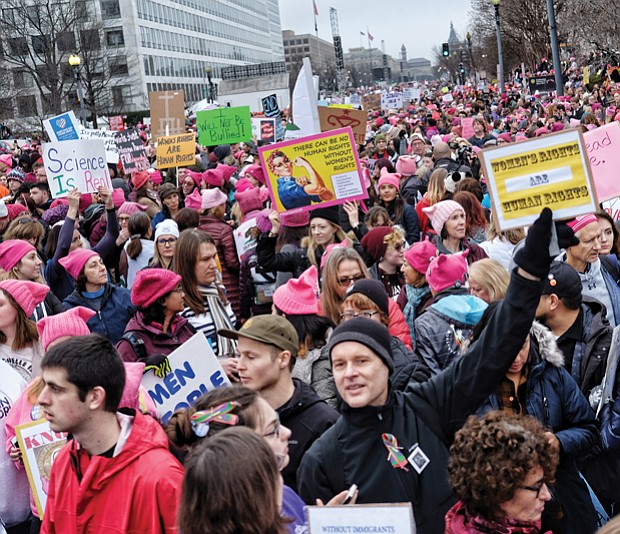 Throngs of demonstrators, many wearing signature pink hats, crowd Washington streets the day after President Trump’s inauguration in January for the Women’s March on Washington.
