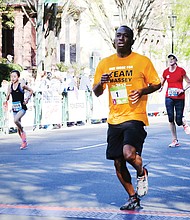 Mayor Stoney, a former high school track and football star, takes part in the Monument Avenue 10K last April. 