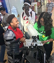 YES Prep student Davenese Bailey is all smiles during a surprise holiday shopping spree at The Galleria. 