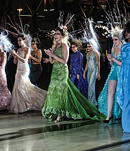 Models dressed in the latest creations by renowned fashion designer Andres Aquino, leading the way, head out for the finale on the runway. Proceeds from the event were to benefit Single Mothers United.  