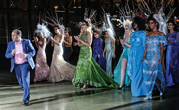 Models dressed in the latest creations by renowned fashion designer Andres Aquino, leading the way, head out for the finale on the runway. Proceeds from the event were to benefit Single Mothers United.  