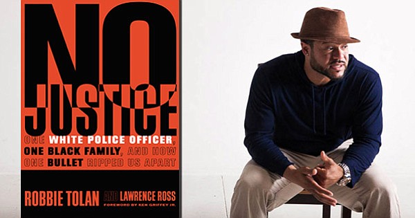 Author Robbie Tolan and his bookcover 
Photo Credit: Cory Dixon