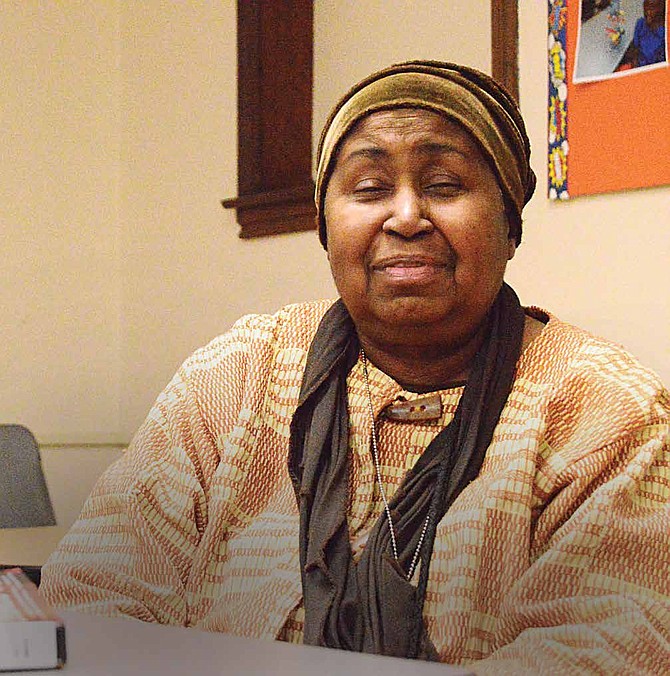 Sandra Mohammad, Chicago Public Library (CPL) Branch Manager of the South Shore Library recently hosted a book club about the book, “Behold the Dreamers by Imbolo Mbue. Photo Credit: Christopher Shuttlesworth