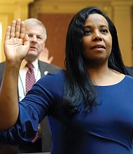 Alexandria Delegate Charniele L. Herring joins members in taking the oath of office to begin a new term