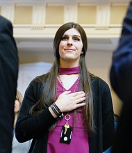 New Manassas Delegate Danica A. Roem, the state’s first openly transgender legislator, takes part in the Pledge of Allegiance. 