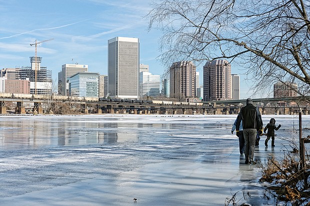 Cityscape // A family walks on the frozen edge of the James River on Sunday, evidence of the frigid conditions that gripped the city over the past two weeks. The first week in January saw temperatures average 17.8 degrees, the coldest for that week since the National Weather Service began taking measurements in Richmond at least 100 years ago. It also broke the average temperature record for the week of 21.1 degrees set in 1918. Good news: Richmond will enjoy ice-melting temperatures this week, with temperatures climbing into the 60s on Friday. The high is expected to be in the 50s Saturday for Gov.-elect Ralph S. Northam’s inauguration before plunging again to the 30s on Sunday and Monday.