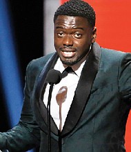 British actor Daniel Kaluuya thanks his mother and “Get Out” writer-director Jordan Peele as he accepts the award for Outstanding Actor in a Motion Picture.