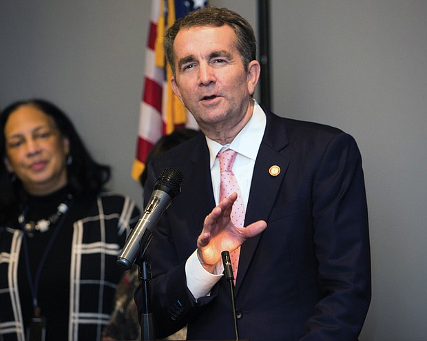 Gov.-elect Ralph S. Northam speaks as retired Judge Birdie Jamison listens at a pre-inaugural reception hosted Jan. 11 at a Downtown hotel by four area NAACP branches. The event was held for the incoming governor, Lt. Gov. Justin E. Fairfax and Attorney General Mark R. Herring to meet members of various African-American organizations and churches that played a significant role in their election on Nov. 7.