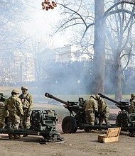 The Virginia National Guard fires a 21-gun salute after Gov. Ralph S. Northam takes the oath of office, another Virginia tradition.
