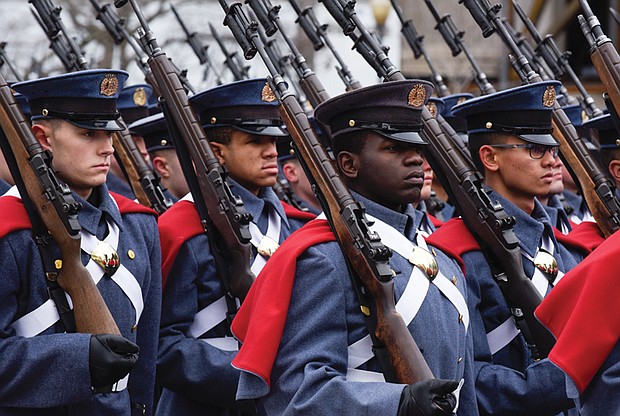 Cadets from Virginia Military Institute, Gov. Ralph S. Northam’s alma mater, lead the parade following a Black Hawk helicopter flyover by the Virginia National Guard.