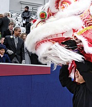 The Pride Chinese Lion Dancers from the University of Virginia in Charlottesville perform a Dragon Dance during the parade.