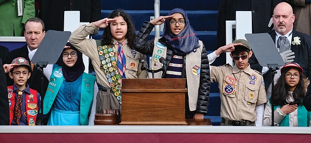 Members of the ADAMS Center Muslim Boy and Girl Scouts and Cub Scouts of Dulles led the inaugural crowd in the Pledge of Allegiance.