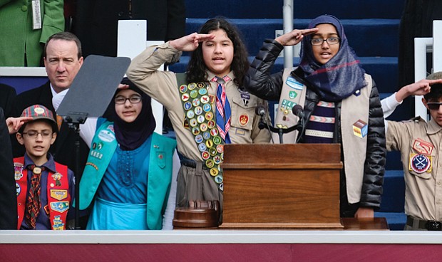 Members of the ADAMS Center Muslim Boy and Girl Scouts and Cub Scouts of Dulles led the inaugural crowd in the Pledge of Allegiance.