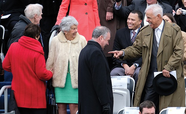 Among the crowd of dignitaries Saturday was former Gov. L. Douglas Wilder, right, who enjoys a laugh with two other former governors and their wives, A. Linwood Holton, far left, and his wife, Jinx, and their daughter and son-in-law, Anne Holton and U.S. Sen. Tim Kaine.