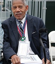 Former state Sen. Henry L. Marsh III, now a commissioner on the Virginia Alcoholic Beverage Control Board, has a front-row seat for the ceremony.