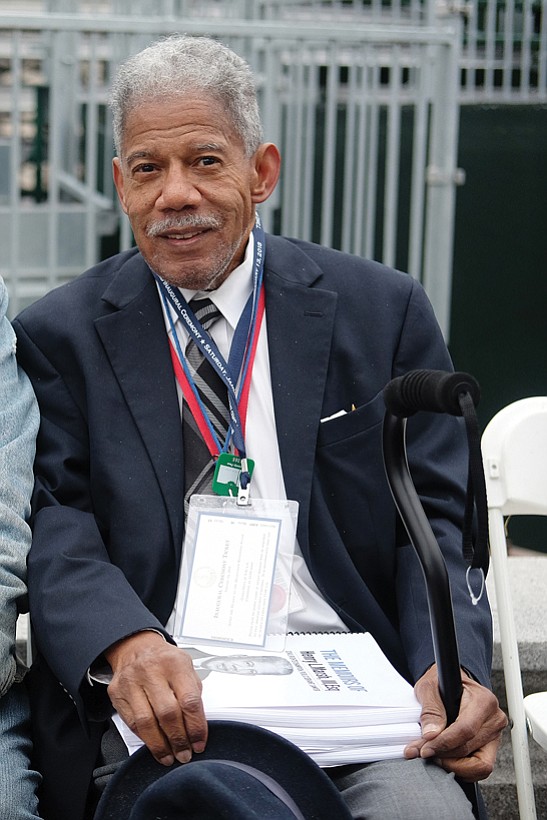 Former state Sen. Henry L. Marsh III, now a commissioner on the Virginia Alcoholic Beverage Control Board, has a front-row seat for the ceremony.