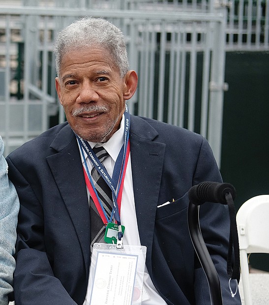 Former state Sen. Henry L. Marsh III, now a commissioner on the Virginia Alcoholic Beverage Control Board, has a front-row seat for the ceremony.