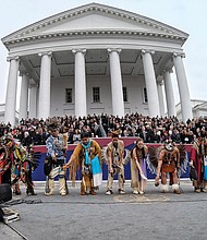 Members of 11 of Virginia’s Native American tribes perform a blessing for the new governor during the ceremony outside the South Portico of the Capitol. 