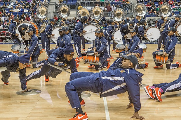The VSU Trojan Explosion Marching Band takes over the floor during Sunday’s halftime show.
